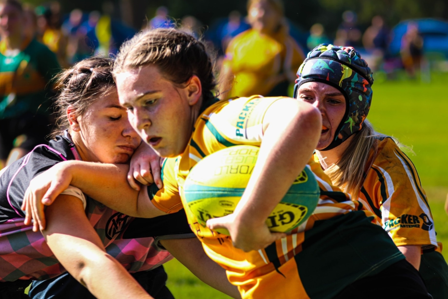 Diverse girls sports team together